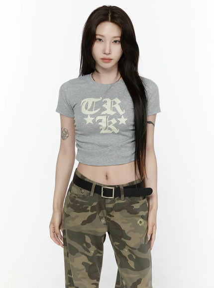 Graphic Crop Top IL522 Grey front model standing straight gothic TRK old-english print cream letters star accents ribbed ruched crop tee