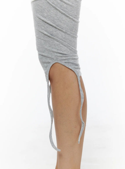 Graphic Layered Skort CL503 Gray close-up side detail of gray capri legging leg showing ruched texture and open-hem drawstring tie construction