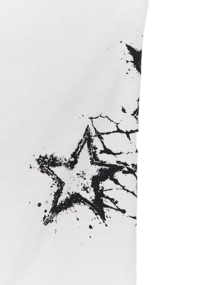 Graphic Layered Skort CL503 Gray close-up flat detail of white skirt hem area showing cracked star splatter graphic print on cotton fabric