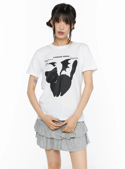 Graphic Meow Tee CU530 White front close-up on model, large black cat silhouette and FONDLOOK text graphic print detail on white cotton crew-neck tee
