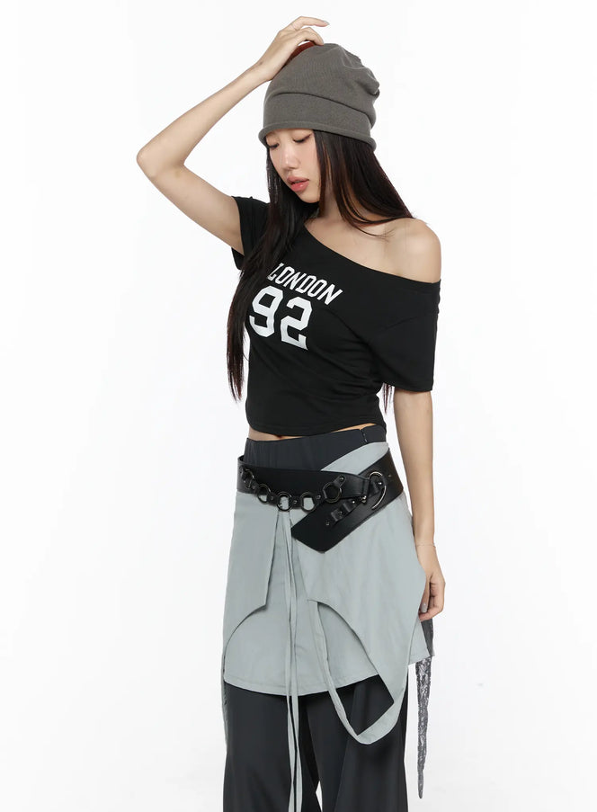 LEWKIN Graphic Off-Shoulder Crop Top CL524 Black S/M front shot on model styled with off-shoulder crop fit and LONDON 92 graphic print