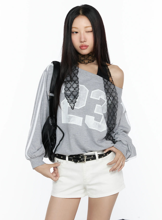 LEWKIN Graphic Off-Shoulder Sweatshirt CL527 Gray S/M front shot on model wearing black lace choker and bag with white shorts