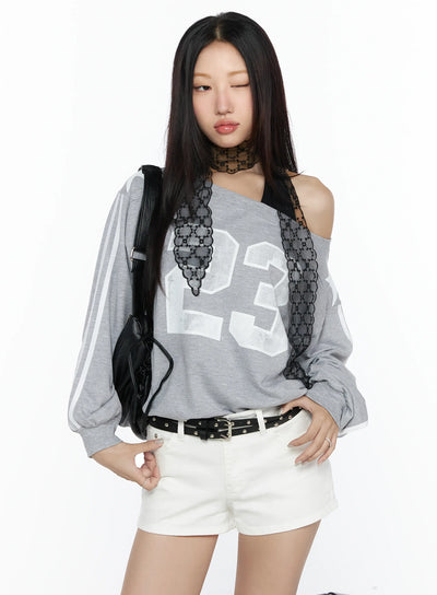 LEWKIN Graphic Off-Shoulder Sweatshirt CL527 Gray S/M front shot on model wearing black lace choker and bag with white shorts