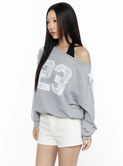 Graphic Off-Shoulder Sweatshirt CL527 Gray three-quarter front shot on model close-up showing 23 number print and asymmetric off-shoulder neckline