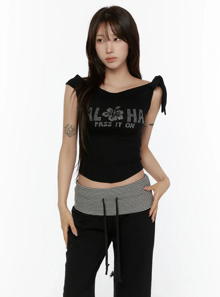 Graphic Off-Shoulder Top CL508 Black front cropped model shot wide off-shoulder neckline rhinestone ALOHA PASS IT ON hibiscus graphic bow-tie shoulder details