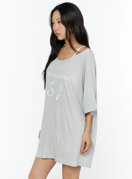 Graphic Print Oversized Tee CU529 Light gray side shot on model as mini dress length showing relaxed drape and inner cami strap detail