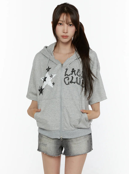 LEWKIN Graphic Print Short Sleeve Hooded Zip-Up CL507 Gray front view on model wearing denim shorts hands in pockets star and letter print