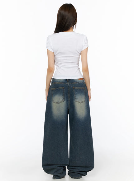 Graphic Short Sleeve T-Shirt IL523 White back model shot showing plain white fitted crop tee back with short sleeves and ribbed texture styled with wide-leg jeans