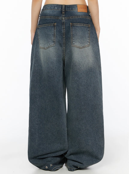 Greer Vintage Wash Baggy Jeans IL523 Dark blue back cropped view on model showing rear pockets ozbridge leather patch label and faded wash