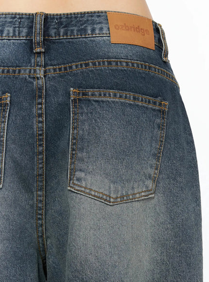 Greer Vintage Wash Baggy Jeans IL523 Dark blue close-up detail of back waist ozbridge tan leather brand patch and amber topstitching