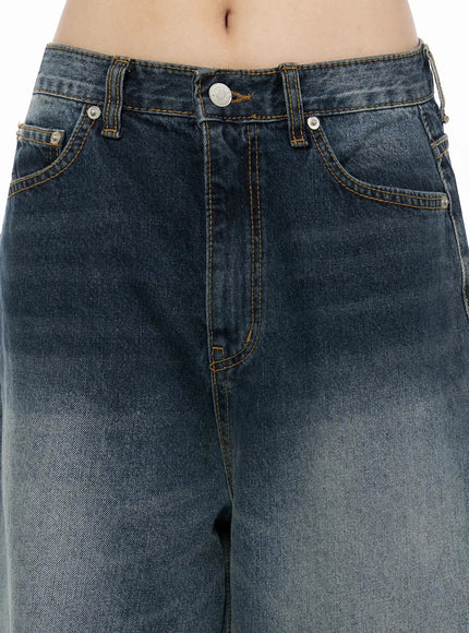 Greer Vintage Wash Baggy Jeans IL523 Dark blue close-up detail of waistband showing silver button coin pocket and amber topstitching