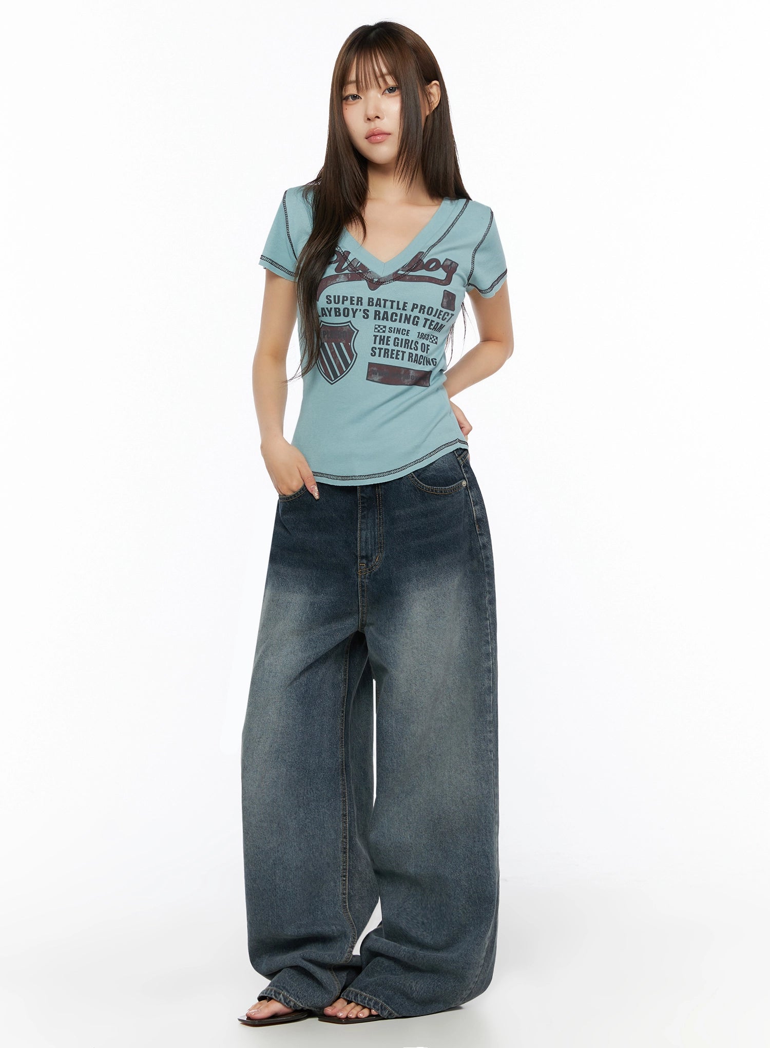 Greer Vintage Wash Baggy Jeans IL523 Dark blue full-length front view on model with graphic tee hand in pocket oversized wide leg
