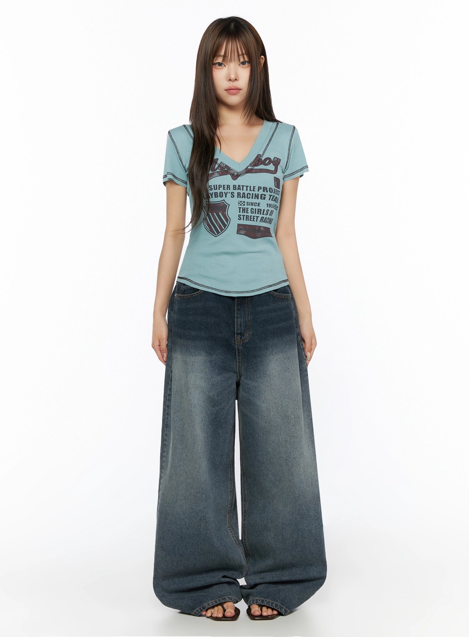 Greer Vintage Wash Baggy Jeans IL523 Dark blue full-length front view on model standing straight with graphic tee tucked casual styling
