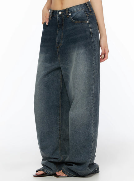 Greer Vintage Wash Baggy Jeans IL523 Dark blue side cropped shot on model showing wide curved leg silhouette and vintage faded wash