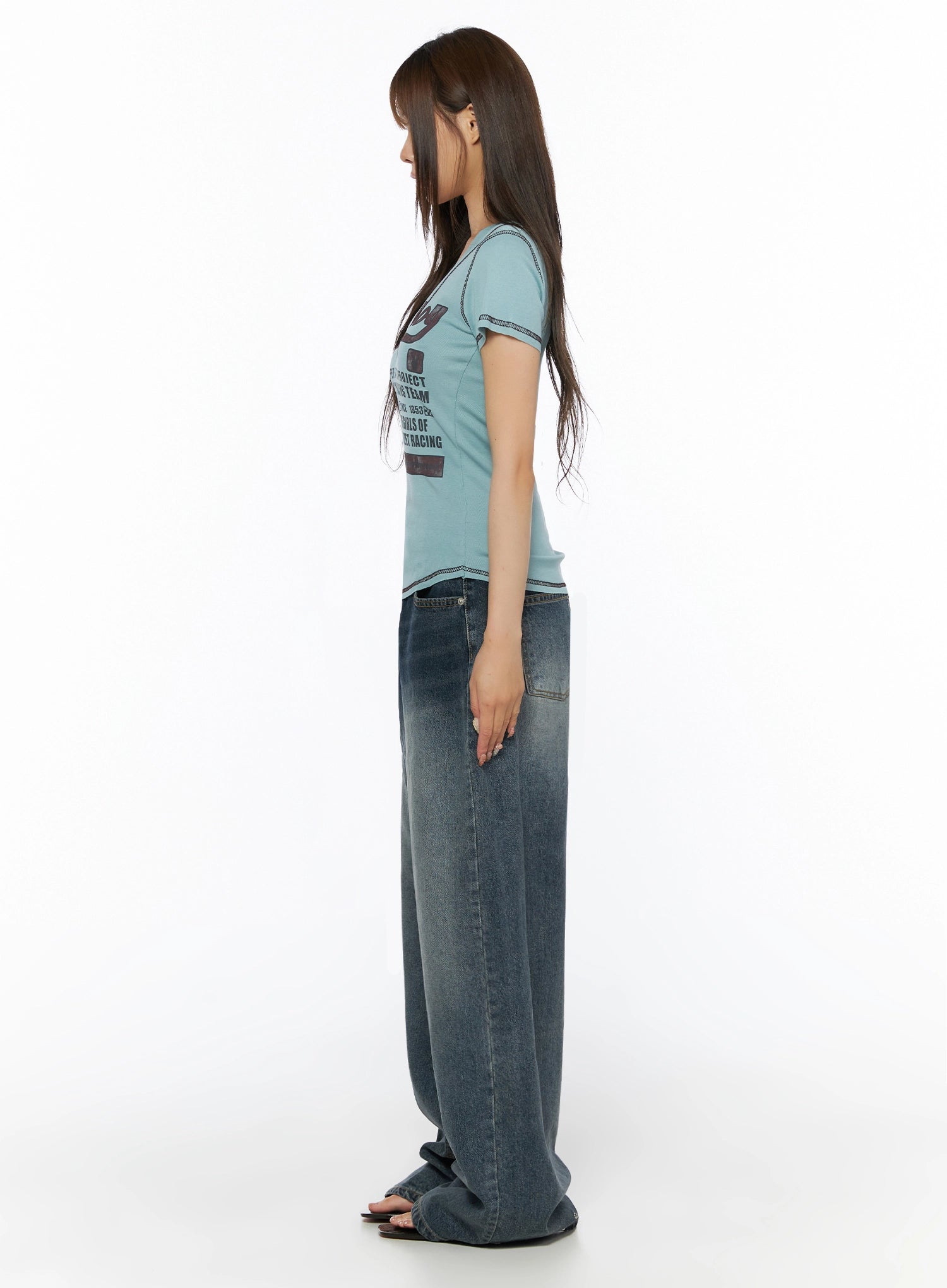 Greer Vintage Wash Baggy Jeans IL523 Dark blue side view on model showing extreme wide-leg silhouette length and faded denim texture