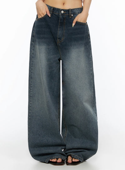 LEWKIN Greer Vintage Wash Baggy Jeans IL523 Dark blue front view on model size S showing wide-leg silhouette with faded wash and hands in pockets