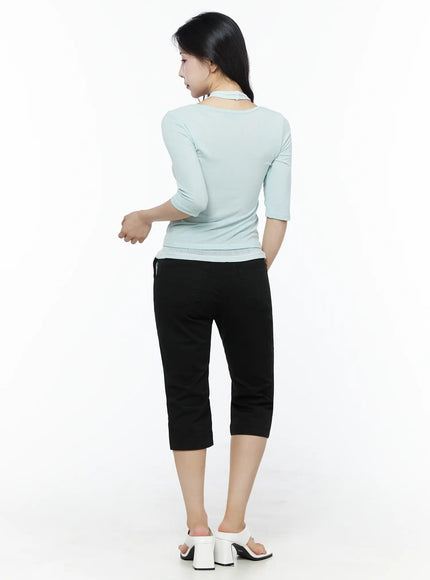 Halter Layered Three-Quarter Sleeve Top IU525 Mint back shot on model showing clean mint knit back and ribbed hem styled with black cropped pants