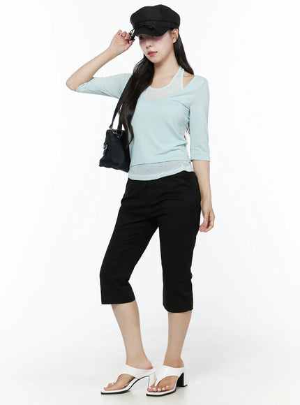 Halter Layered Three-Quarter Sleeve Top IU525 Mint full-body angled shot on model with black baker boy cap and black shoulder bag styled with black cropped pants