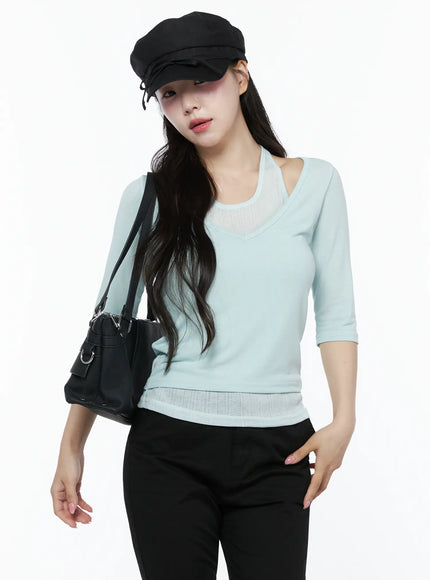 LEWKIN Halter Layered Three-Quarter Sleeve Top IU525 Mint front shot on model wearing black baker boy cap and black bag styled with black trousers