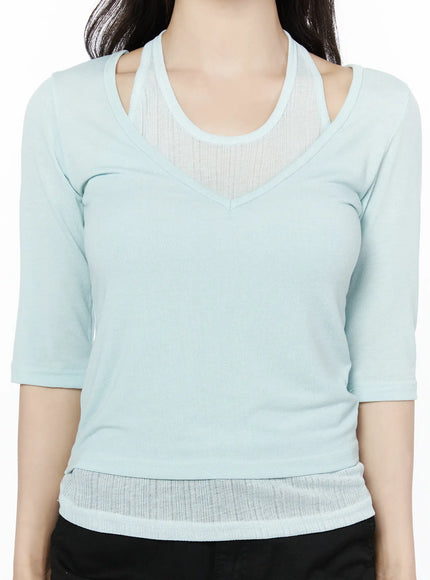 Halter Layered Three-Quarter Sleeve Top IU525 Mint close-up front detail shot showing V-neck mesh panel halter strap layering and ribbed waist hem texture