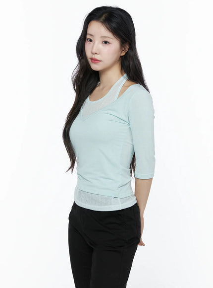 Halter Layered Three-Quarter Sleeve Top IU525 Mint side shot on model showing ribbed hem and sheer V-neckline panel detail with layered halter strap