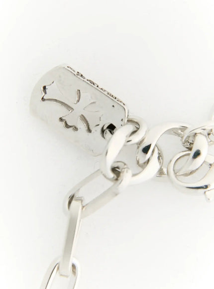 Haven Bold Heart Bracelet IL522 silver close-up detail of engraved rectangular tag charm and lobster clasp hardware
