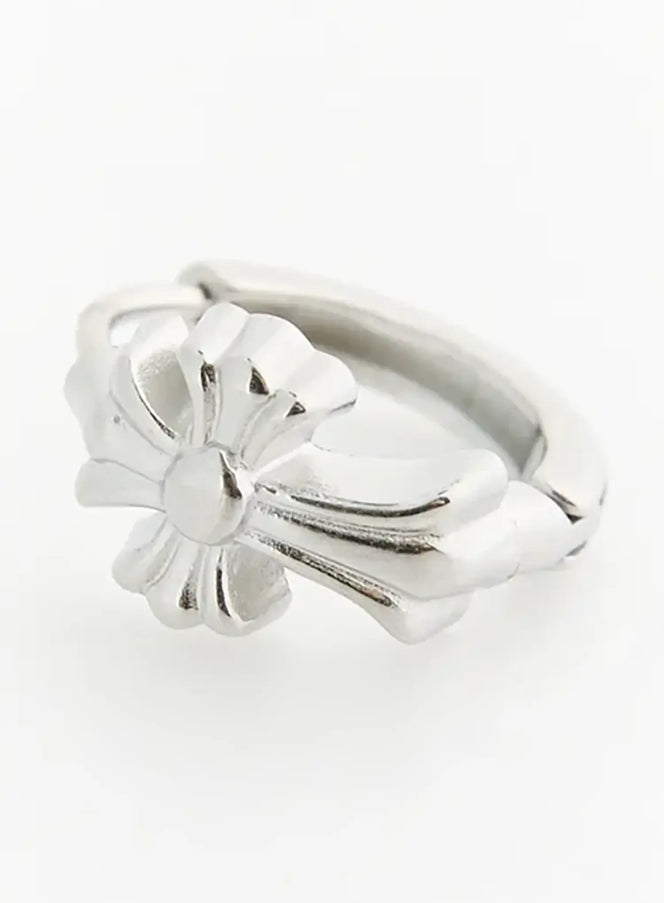 Haven Bold Heart Earrings IL522 silver close-up angled view highlighting embossed floral cross charm and chunky hoop clasp detail