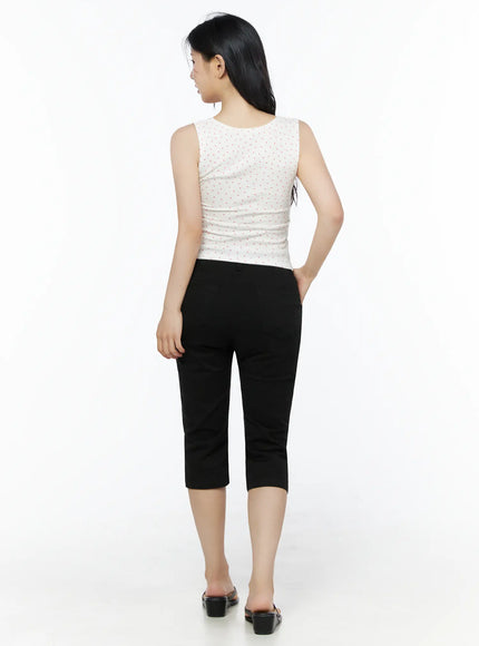 Heart Polka Dot Tank Top IU525 White back view on model wearing black capri pants, showing back neckline, wide straps, and heart print ribbed knit