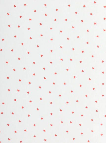 Heart Polka Dot Tank Top IU525 White close-up fabric detail showing scattered red heart print pattern on white ribbed knit texture