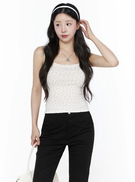 LEWKIN Heart Polka Dot Tank Top IU525 White front view on model wearing headband, paired with black pants, showing red heart print ribbed fabric