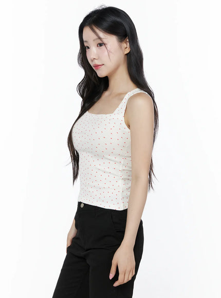 Heart Polka Dot Tank Top IU525 White side view on model showing fitted profile, square neckline strap detail, and red heart print ribbed texture