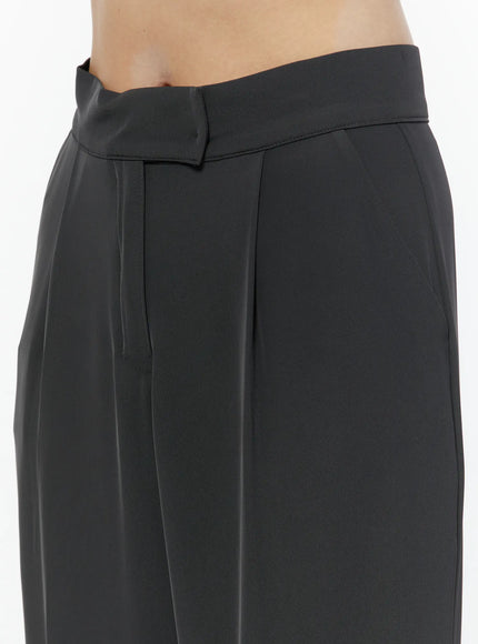 Hidden Buckle Wide Leg Tailored Pants IL506 Dark gray close-up detail shot on model showing waistband construction, front pleat and woven fabric texture