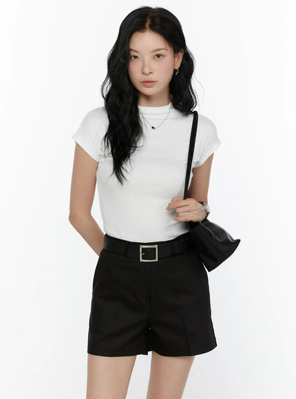 LEWKIN High Neck Cap Sleeve Top CL521 White front view on model size S/M styled with black shorts belt and shoulder bag