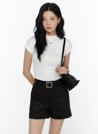 LEWKIN High Neck Cap Sleeve Top CL521 White front view on model size S/M styled with black shorts belt and shoulder bag