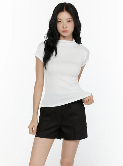High Neck Cap Sleeve Top CL521 White front close-up on model showing mock neck ribbed texture and fitted cap sleeve silhouette