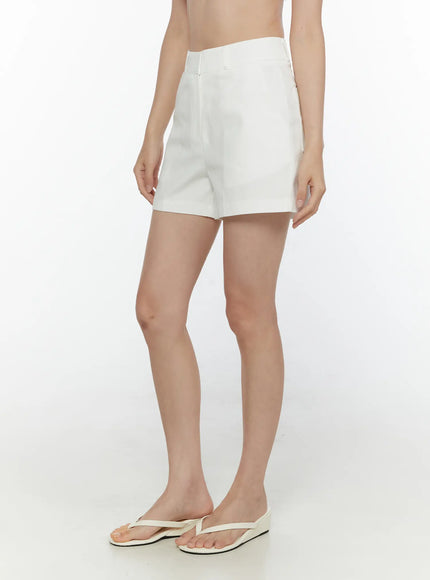 High-Waist Cotton Shorts CL521 White side view on model with white flip-flops showing side seam and pocket detail