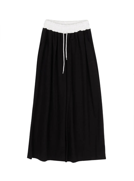 High-Waist Lace Wide Leg Sweatpants IL506 Black flat-lay front view showing white smocked lace waistband white drawstring and wide-leg maxi length silhouette