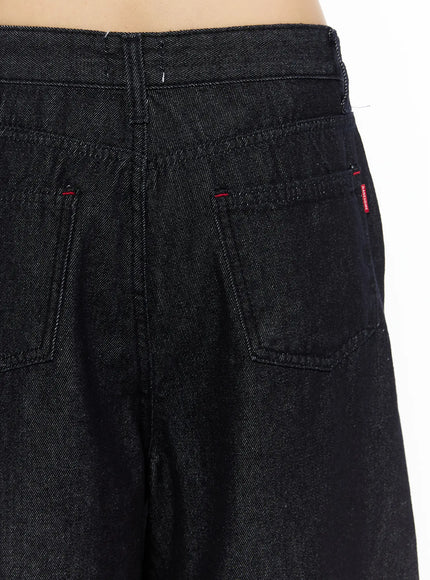 High-Waist Pintuck Jorts CU530 black close-up back detail shot showing dual patch pockets red stitching and brand label on dark denim