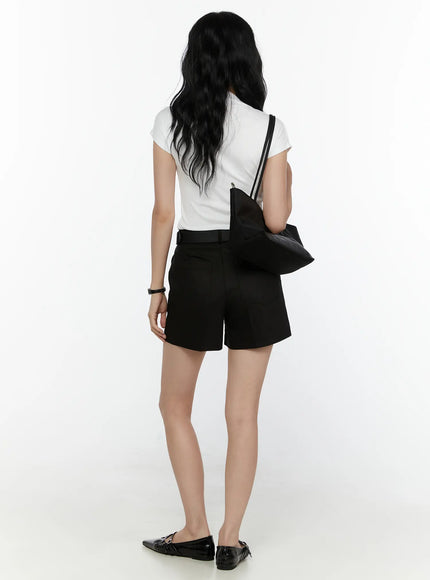 High-Waist Tailored Shorts CL521 black full-body back shot on model styled with white tee and black shoulder bag