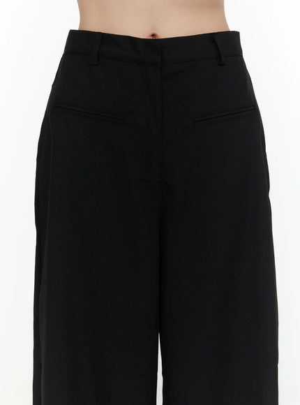 High-Waist Wide Leg Tailored Pants (Black) CL520 Black close-up detail of high waistband, belt loops, and slash pocket seam on model