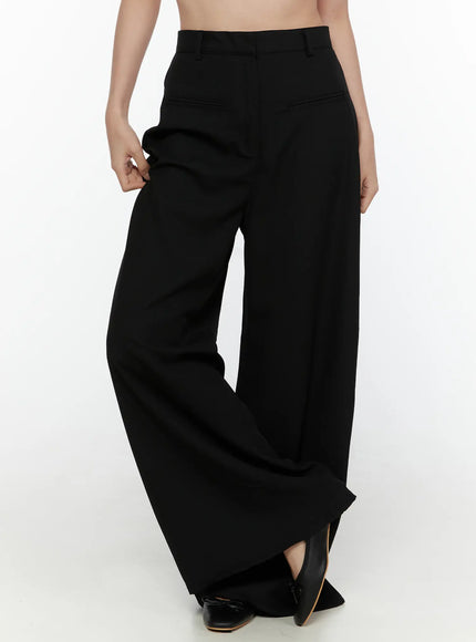 LEWKIN High-Waist Wide Leg Tailored Pants (Black) CL520 Black Size S front close-up on model showing high waist, belt loops, and wide flared leg with black heeled mules