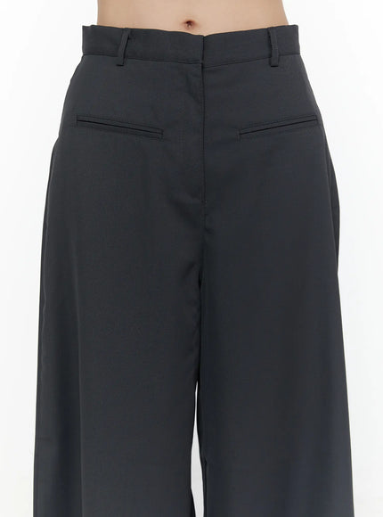 High-Waist Wide Leg Tailored Pants (Dark Gray) CL520 dark gray close-up detail of back waistband welt pockets and wide-leg silhouette on model