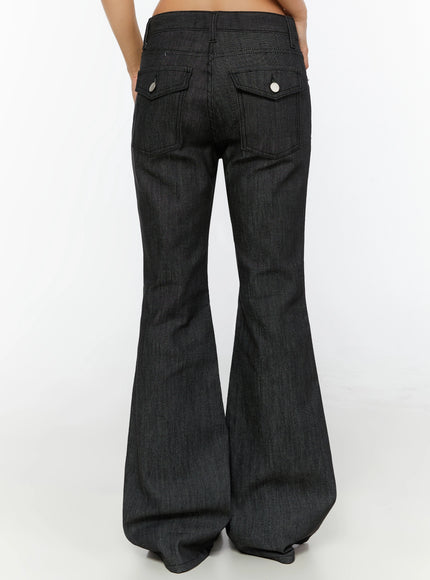 Hina No-Fade Bootcut Flared Jeans IL524 Black back three-quarter crop shot on model showing wide flared leg and full back view with pointed boots