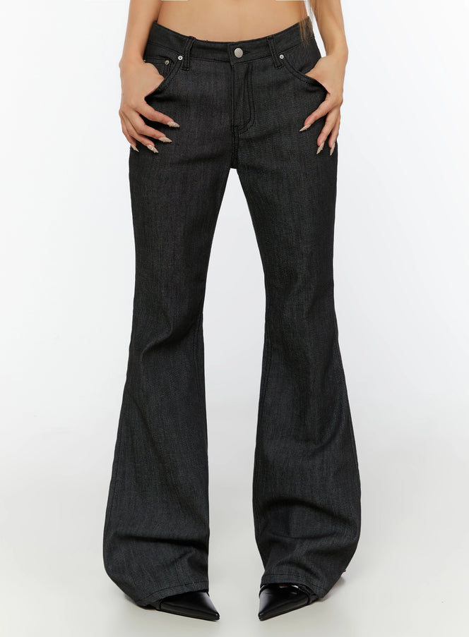LEWKIN Hina No-Fade Bootcut Flared Jeans IL524 Black front close-up on model hands in pockets showing low-rise waist silver button and denim texture