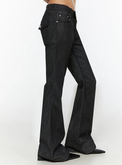 Hina No-Fade Bootcut Flared Jeans IL524 Black side three-quarter crop shot on model highlighting side seam flare silhouette snap pocket and denim weave