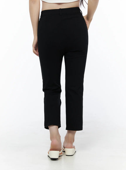 Hip-Pad Capri Slacks IU525 Black back view close-up on model showing rear waistband and straight cropped hem, white crop top, white block-heel mules