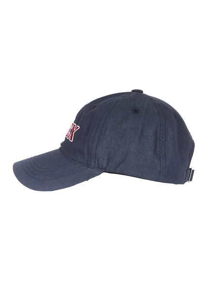 Index Cotton Ball Cap IL503 Navy side profile product shot on white background, curved brim and six-panel construction, partial red INDEX embroidery visible
