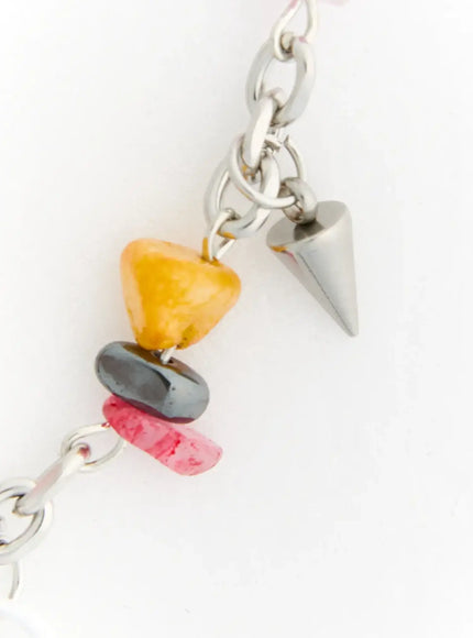 Iris Color Stone Necklace IL517 multicolor close-up detail of yellow orange gray and pink stone chips with silver spike charm on chunky silver chain
