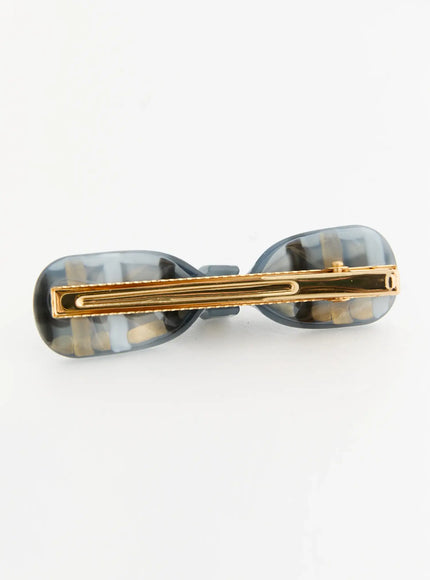 Ivy Mix Hair Pin IL503 gray back detail showing gold-tone metal bar clasp with serrated rail on dark gray and beige marbled resin barrette
