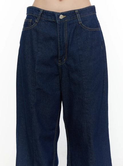 Jael Dark Washed Wide Leg Jeans CL520 Dark blue close-up detail of waistband and upper thigh showing front pockets, center crease seam, and contrast yellow stitching